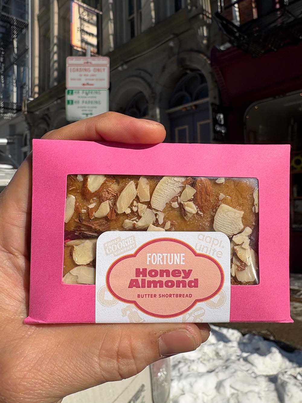 Almond Honey Fortune Shortbread topped with sliced almonds and a fortune message